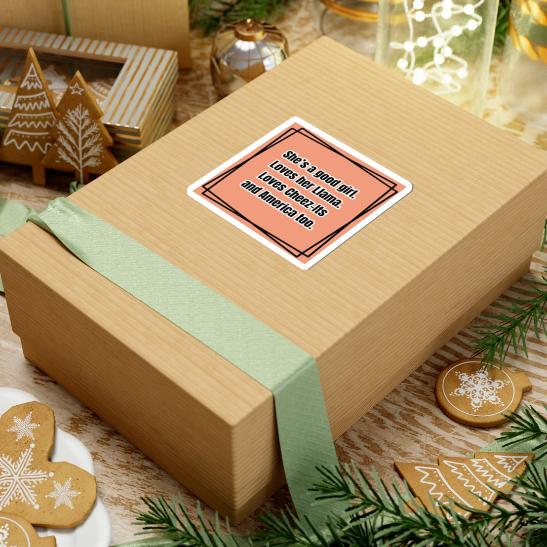 Wooden gift box with a pink card on a festive background with cookies and greenery