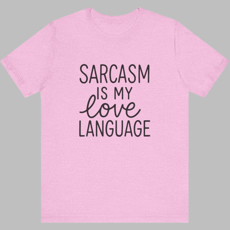 Pink t-shirt with 'Sarcasm is my love language' text on a white background