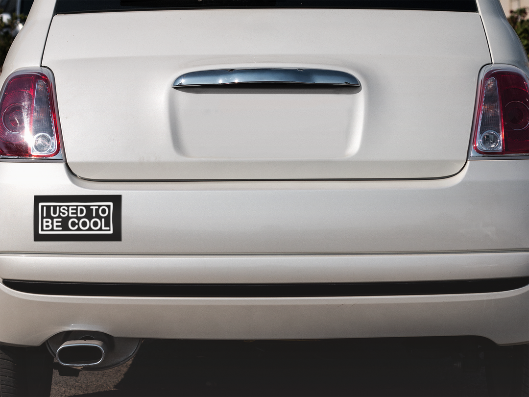 Car trunk with a 'Used to be cool' bumper sticker