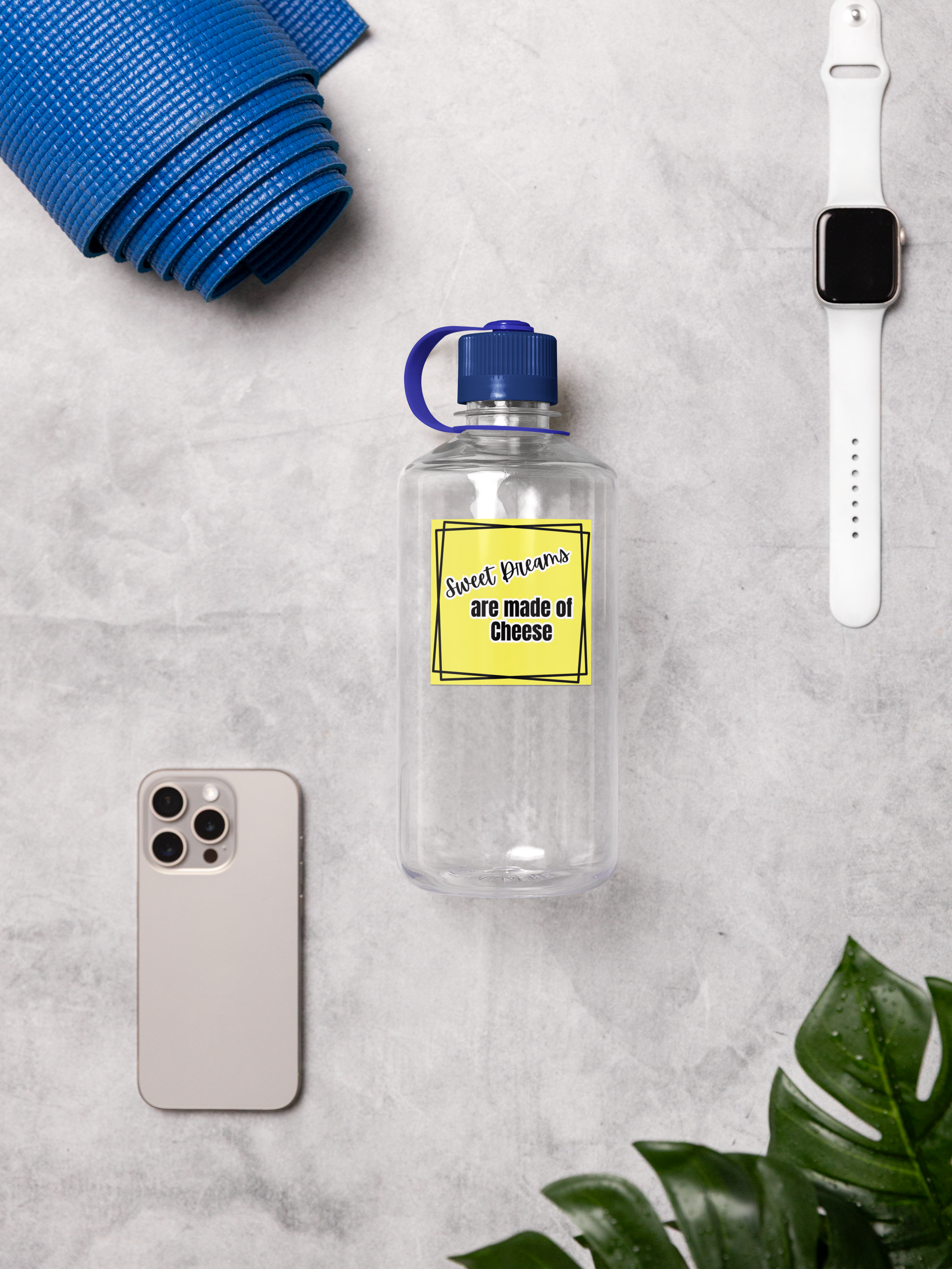 Clear water bottle with a yellow label, phone, yoga mat, and smartwatch on a gray surface.