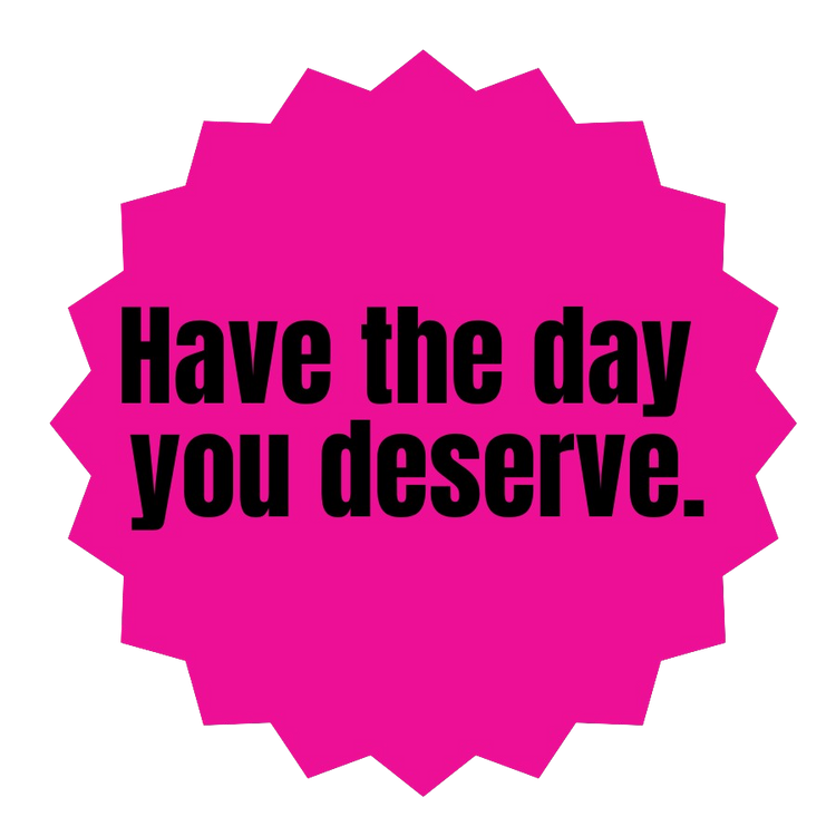 Motivational quote 'Have the day you deserve.' on a pink background