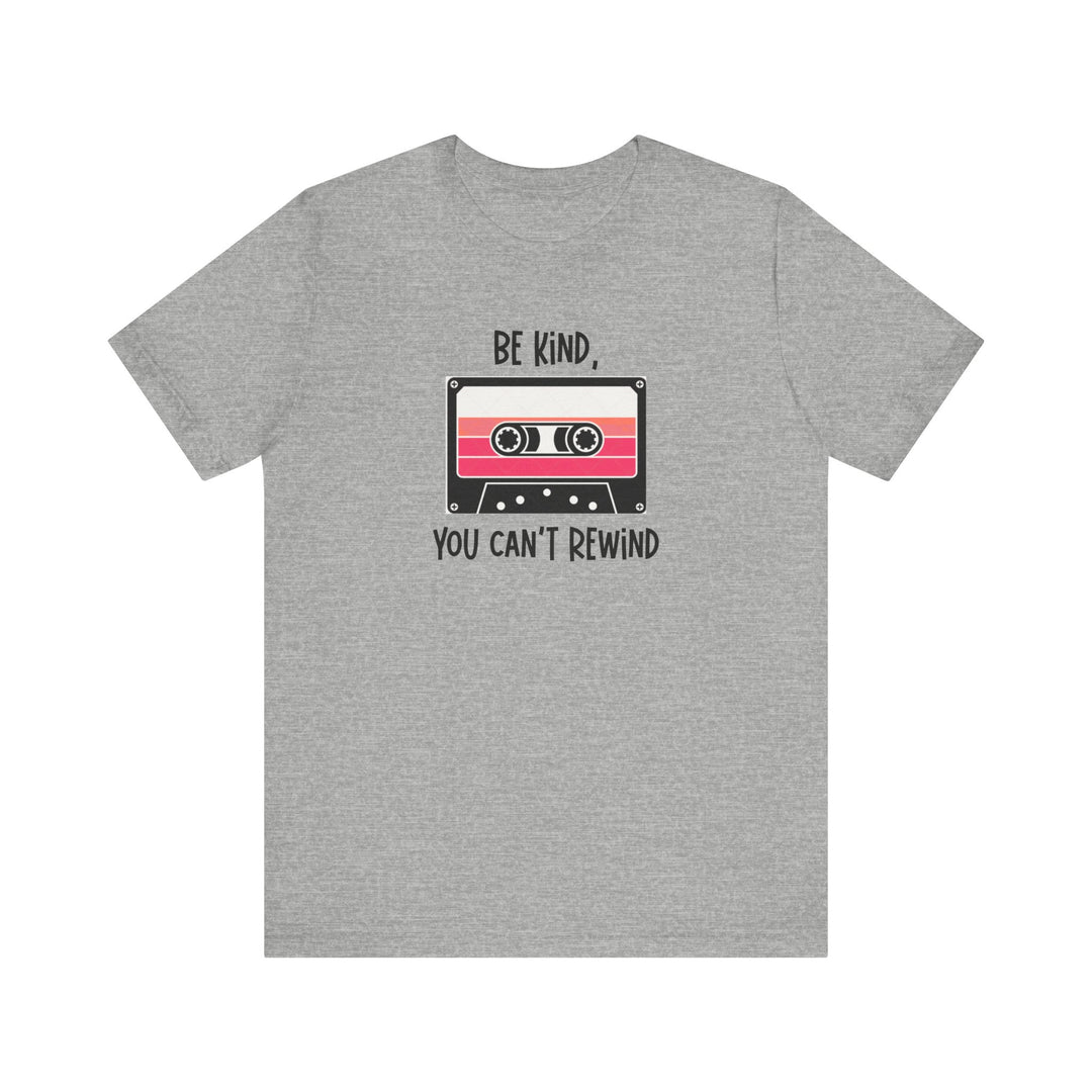 Rock retro vibes with this “Be Kind You Can’t Rewind” cassette tape tee. Funny, positive, and nostalgic graphic shirt for 80s & 90s music lovers.