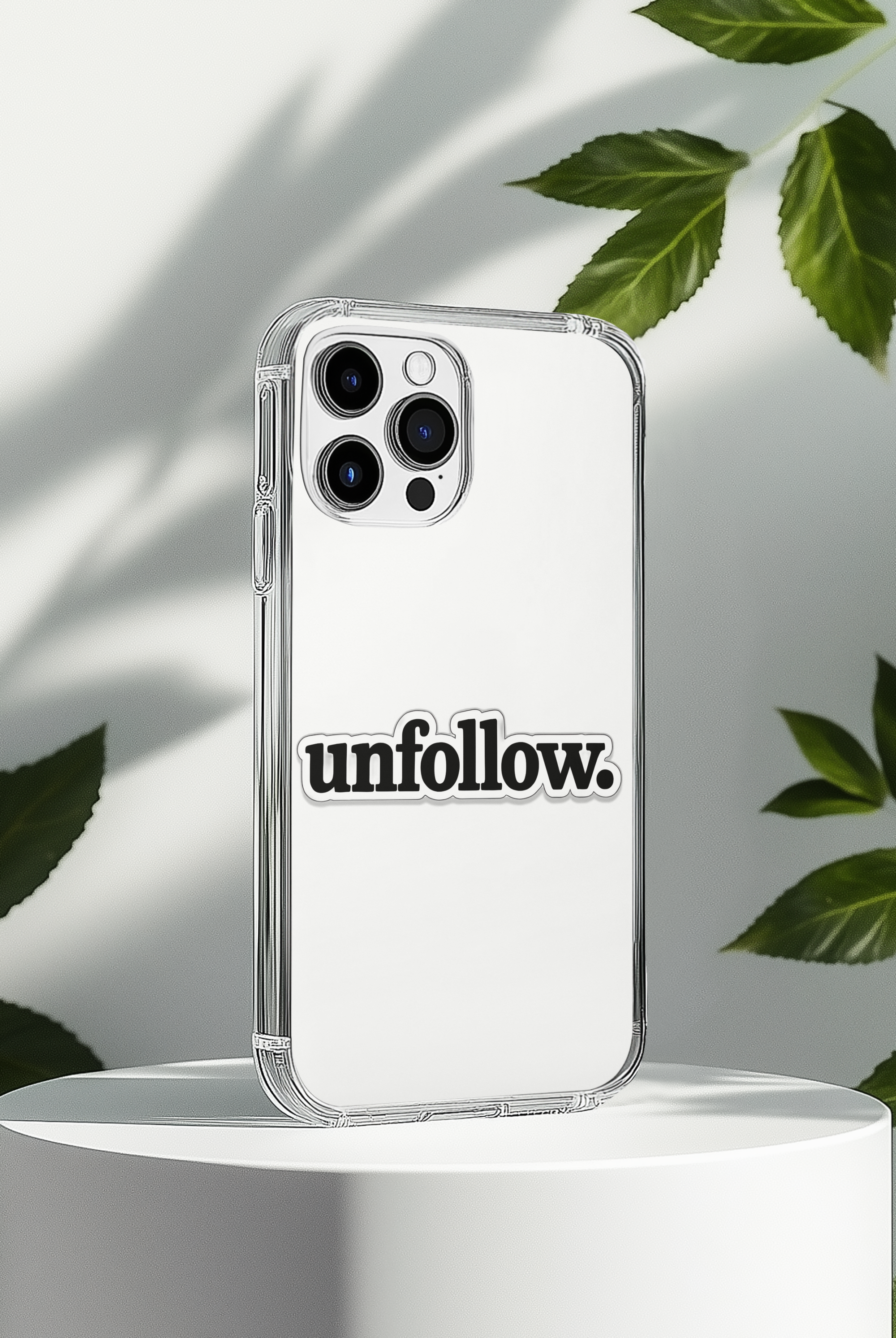 Phone case with 'unfollow' text on a white background with leaves